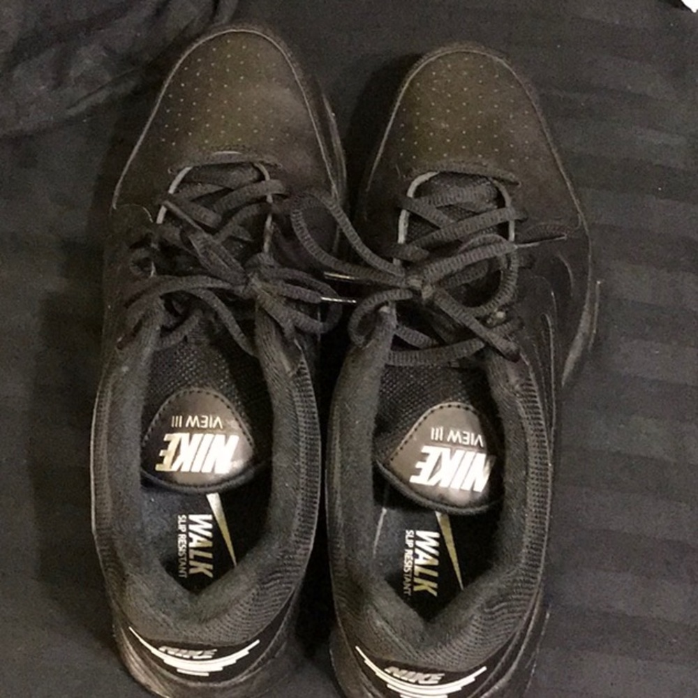 Nike Black non-slip work shoe.